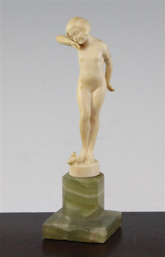 Attributed to Ferdinand Preiss, An Art Deco carved ivory figure of a young girl, 6in.